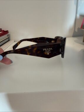 Prada Tortoiseshell Acetate Sunglasses with Gold Logo